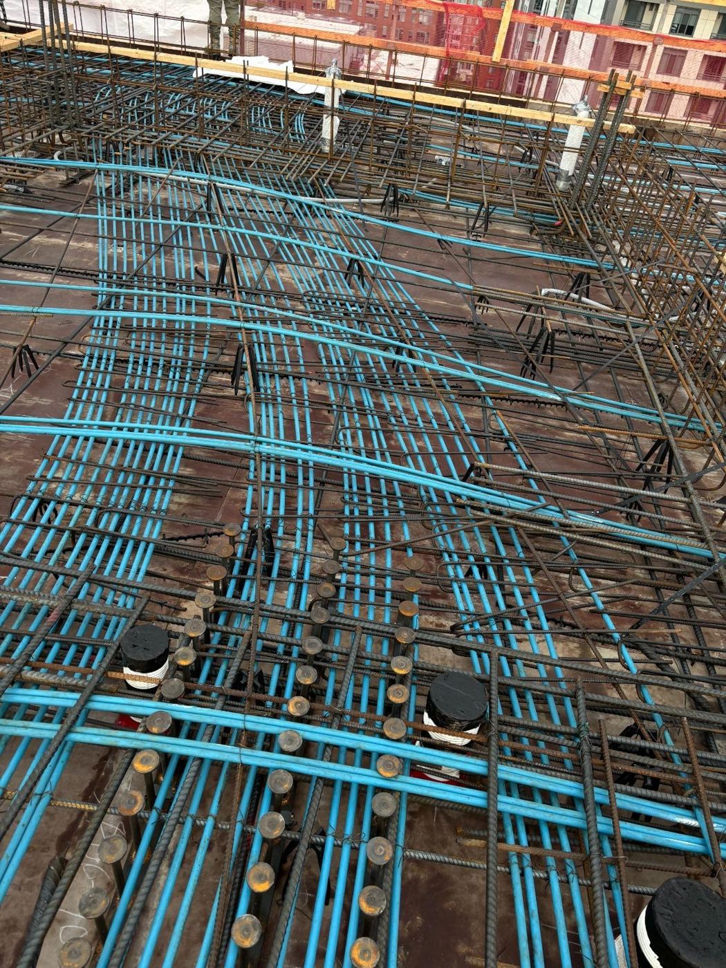 Post-tension deck with shear studs at columns