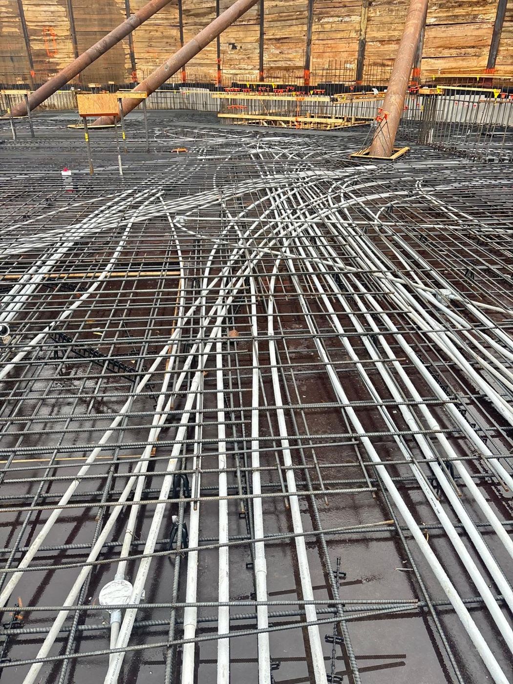 Elevated deck with rebar grid and conduit
